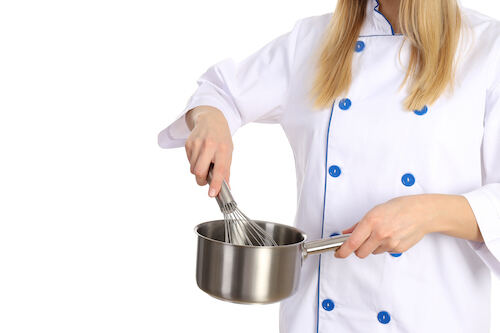 Cozinhe fervendo na panela